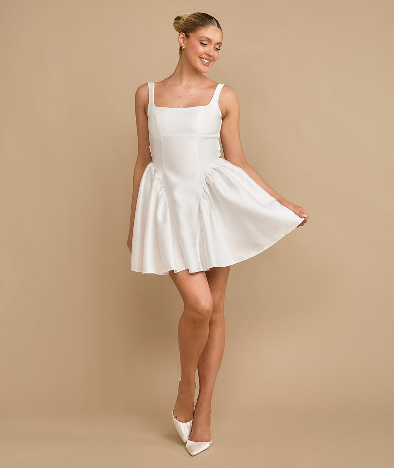 Satin Bow Back Pleated Skirt Mini Dress - White Six Stories Satin Bow Back Pleated Skirt Mini Dress - White Six Stories